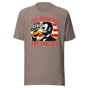 Get festive with our Day Drinking Like Abe Lincoln Tee! Perfect for 4th of July BBQs and showing off your patriotic spirit in style. Cozy & stylish.