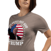 Woman wearing a "Even Bullets Can't Stop Trump" t-shirt with American flag emblem.