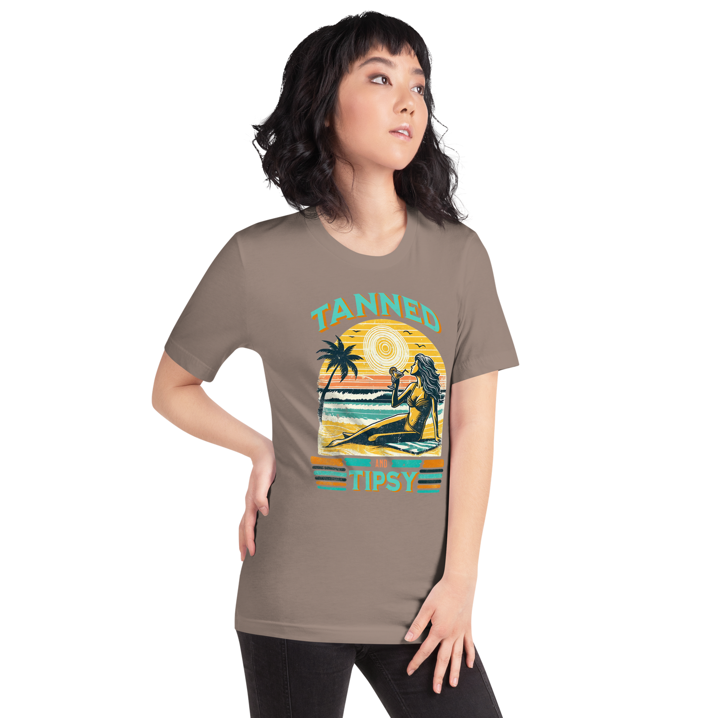 Vintage-inspired 'Tanned and Tipsy' tee with a woman sipping a cocktail on a beach at sunset, perfect for beach drinking and summer parties.