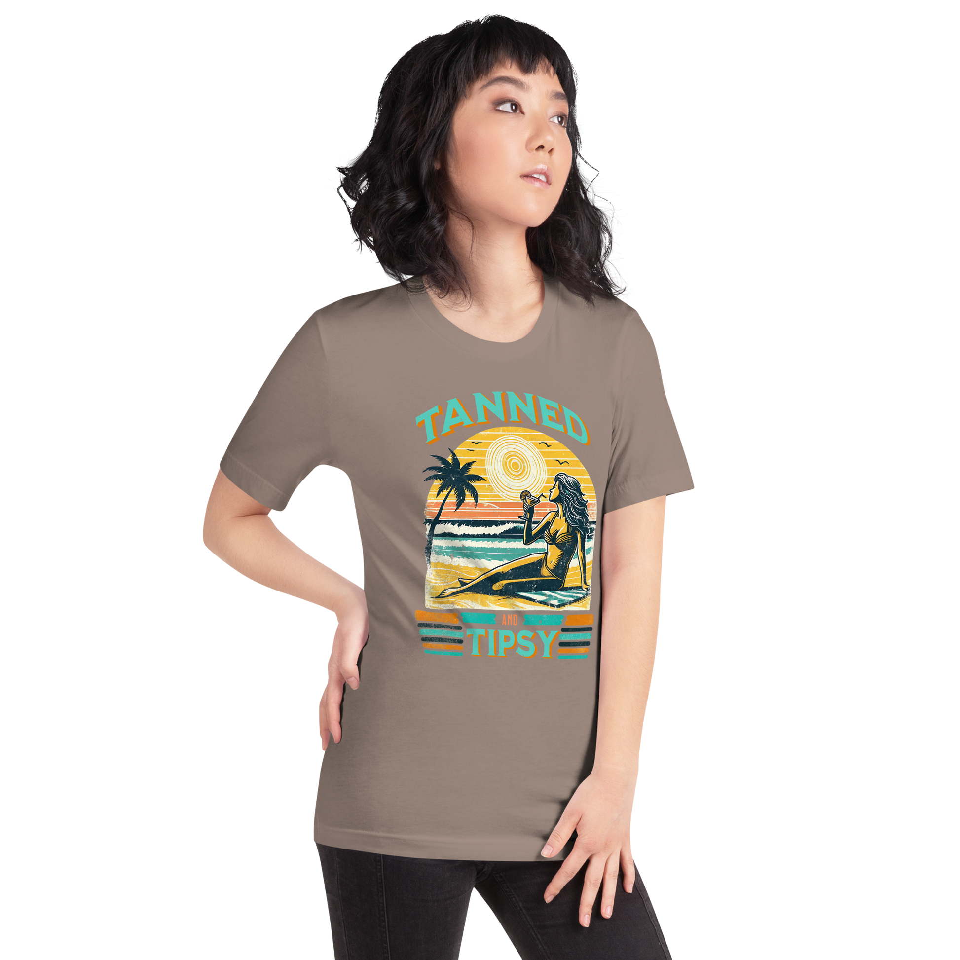 Vintage-inspired 'Tanned and Tipsy' tee with a woman sipping a cocktail on a beach at sunset, perfect for beach drinking and summer parties.