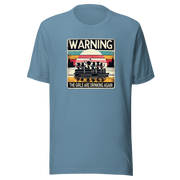 Tee showing "Warning: The Girls Are Drinking Again" with an image of girls on a pontoon boat enjoying drinks at sunset.