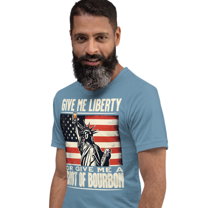 T-shirt with Give Me Liberty or Give Me a Shot of Bourbon text, Statue of Liberty holding a shot glass, and distressed American flag background. Perfect for 4th of July.