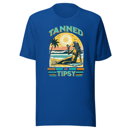 Vintage-inspired 'Tanned and Tipsy' tee with a woman sipping a cocktail on a beach at sunset, perfect for beach drinking and summer parties.