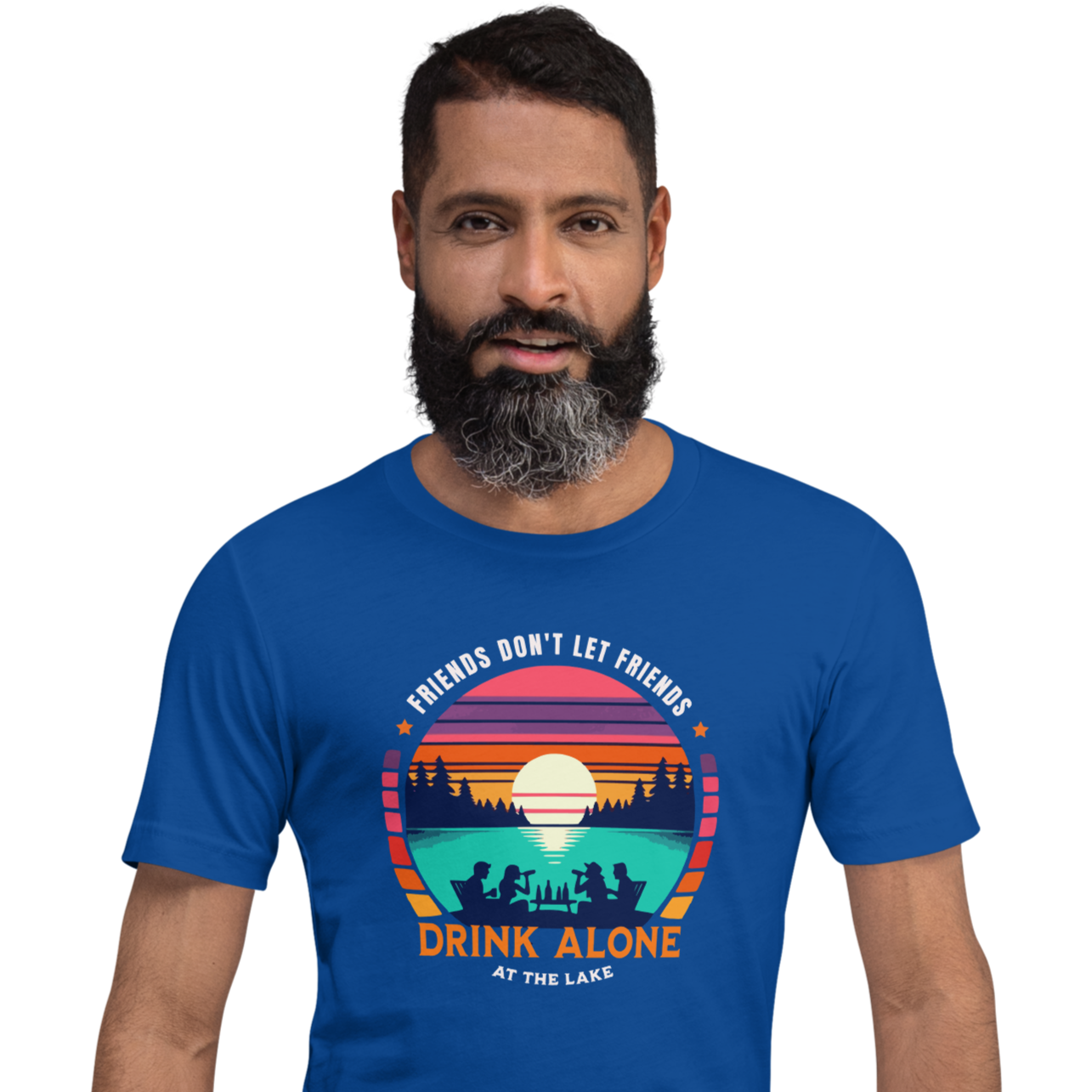 Tee showcasing "Friends Don't Let Friends Drink Alone at the Lake" with a retro sunset and lake scene.