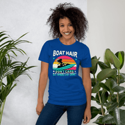 Tee with "Boar Hair Don't Care, But Where's My Drink?" and a woman on a jet ski against a retro sunset backdrop.