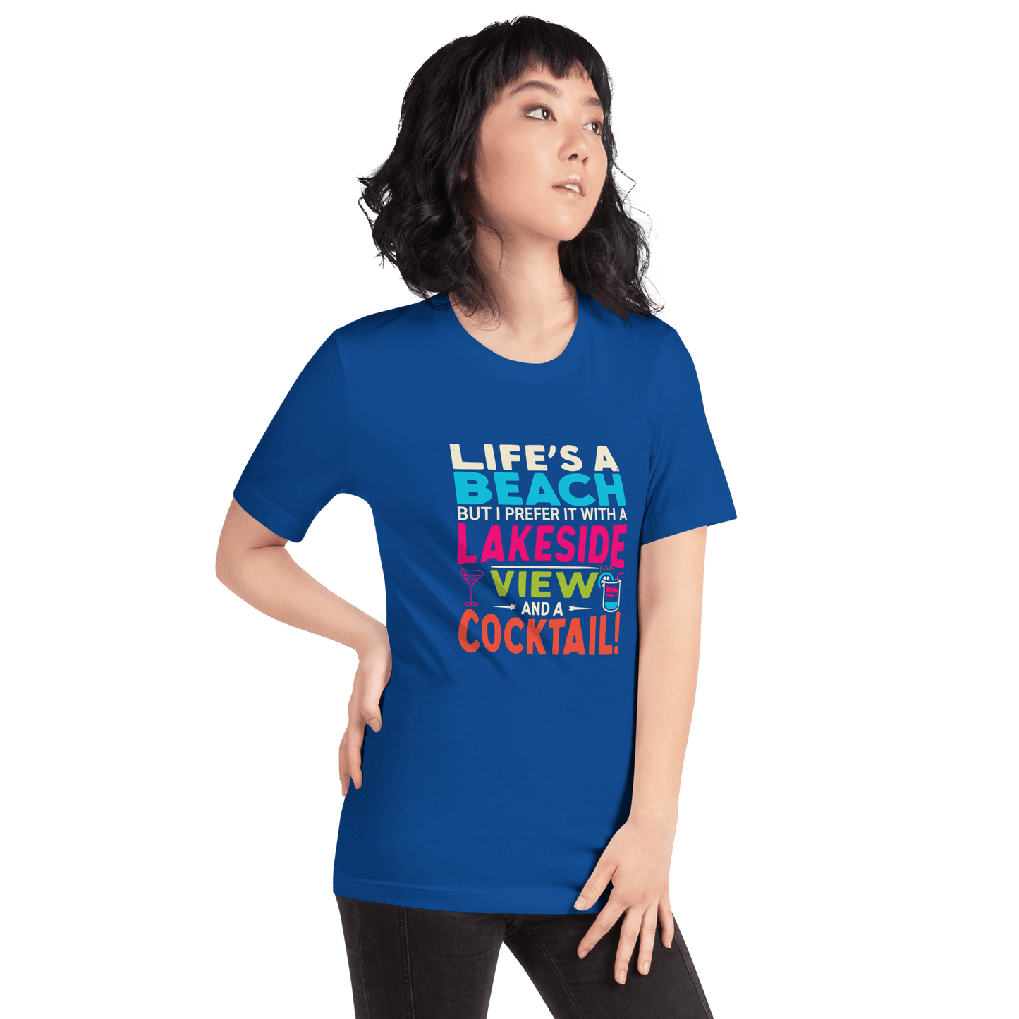 Tee displaying "Life's a Beach but I Prefer It with a Lakeside View and a Cocktail" in bright, eye-catching colors.