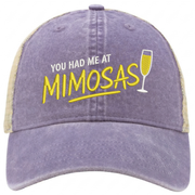 a violet and khaki ponytail trucker hat with 'You Had Me at Mimosas' text funny spring break, summer vacation, beach trip, lake season, girls trip or bachelorette had