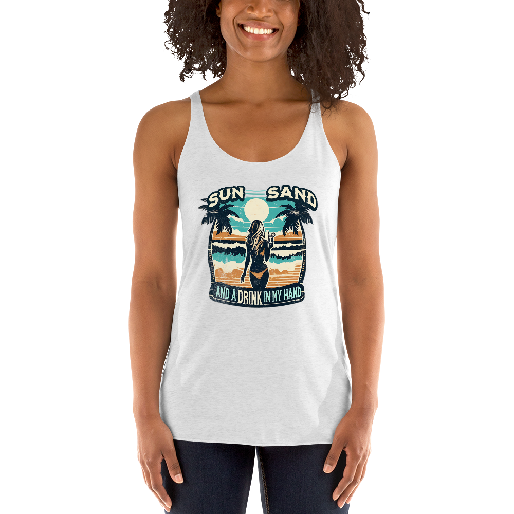 Beach scene on 'Sun, Sand, and a Drink in My Hand' racerback tank, with woman holding cocktail.