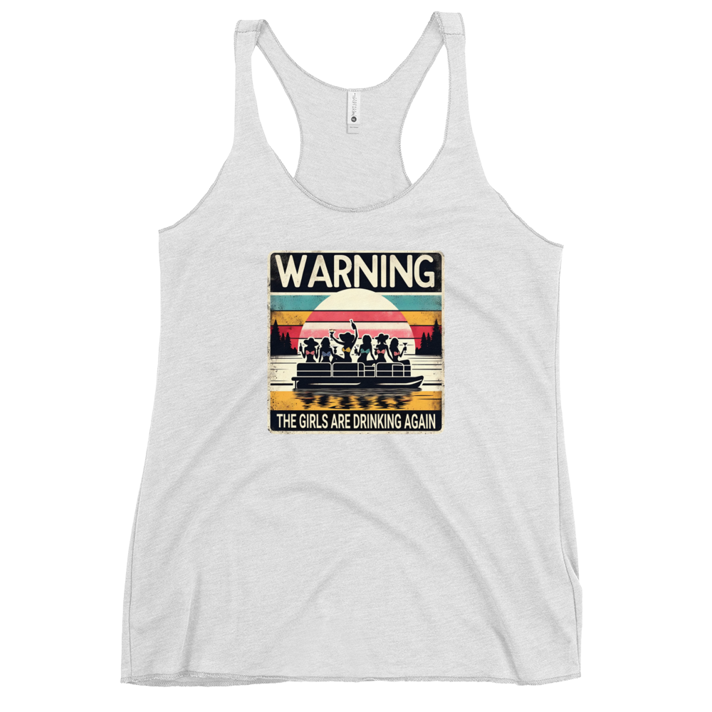 Racerback tank featuring "Warning: The Girls Are Drinking Again" with an illustration of girls drinking on a pontoon boat at sunset.