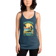 Retro 'Tanned and Tipsy' racerback tank with a woman enjoying a sunset cocktail on the beach, ideal for summer beach parties and day drinking.