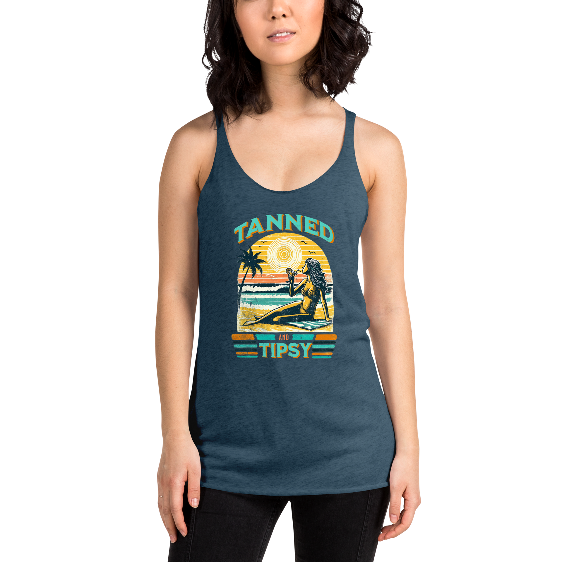 Retro 'Tanned and Tipsy' racerback tank with a woman enjoying a sunset cocktail on the beach, ideal for summer beach parties and day drinking.