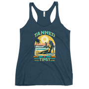 Retro 'Tanned and Tipsy' racerback tank with a woman enjoying a sunset cocktail on the beach, ideal for summer beach parties and day drinking.