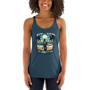 Beach scene on 'Sun, Sand, and a Drink in My Hand' racerback tank, with woman holding cocktail.