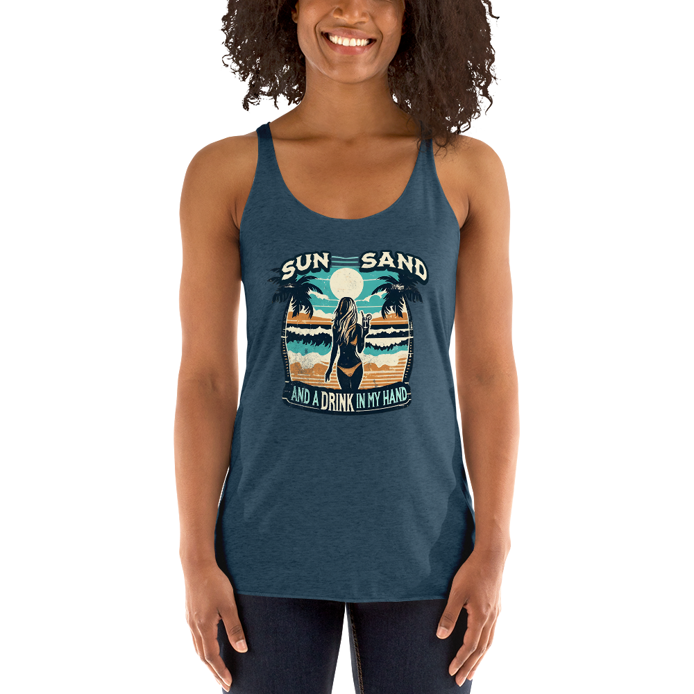 Beach scene on 'Sun, Sand, and a Drink in My Hand' racerback tank, with woman holding cocktail.