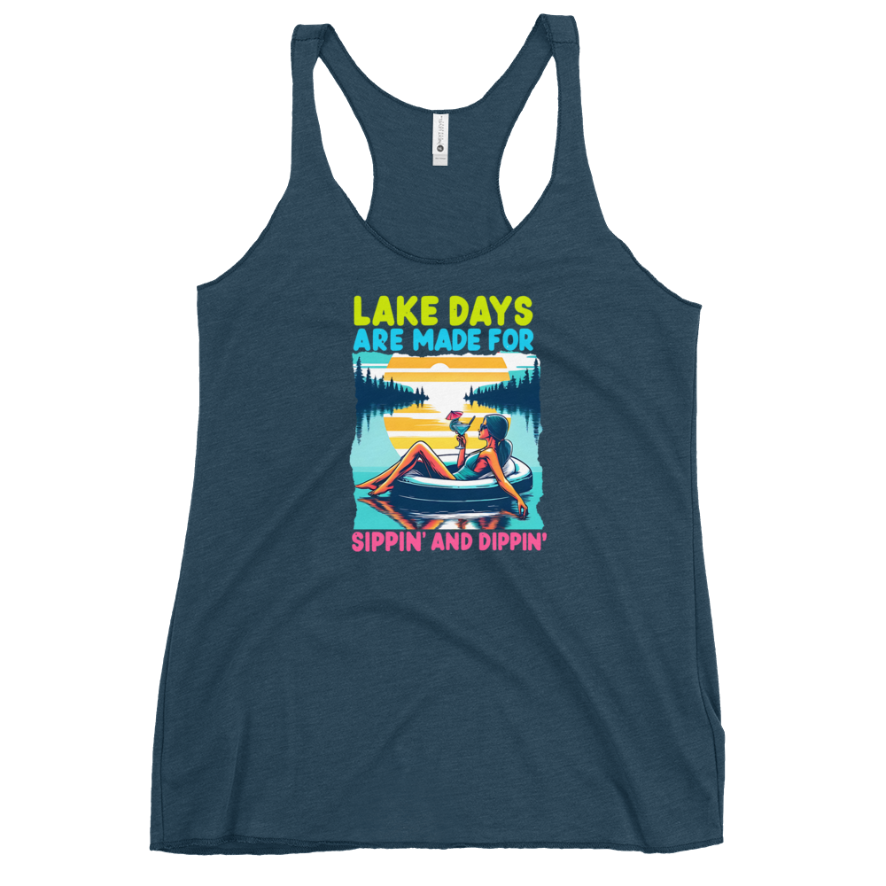 Racerback tank with "Lake Days Are Made for Sipping and Dipping," featuring a woman on a tube float with a cocktail, against a lake and sunset.