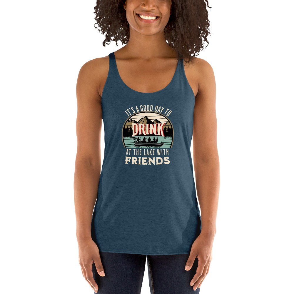 Racerback tank featuring "It's a Good Day to Drink at the Lake with Friends," with people on a boat, lake, and mountains in the background.