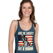 Racerback tank with Give Me Liberty or Give Me a Shot of Bourbon text, Statue of Liberty holding a shot glass, and distressed American flag background. Perfect for 4th of July.