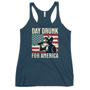 Racerback tank with Day Drunk for America text, silhouette of a man drinking a bottle of beer, and distressed American flag background. Perfect for 4th of July.