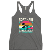 Racerback tank with "Boar Hair Don't Care, But Where's My Drink?" featuring a woman on a jet ski against a sunset.