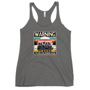 Racerback tank featuring "Warning: The Girls Are Drinking Again" with an illustration of girls drinking on a pontoon boat at sunset.