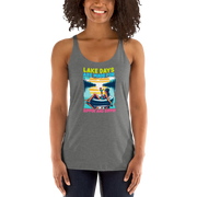 Racerback tank with "Lake Days Are Made for Sipping and Dipping," featuring a woman on a tube float with a cocktail, against a lake and sunset.