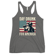 Racerback tank with Day Drunk for America text, silhouette of a man drinking a bottle of beer, and distressed American flag background. Perfect for 4th of July.