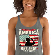 Racerback tank with Celebrating America One Shot at a Time text, silhouette of a man drinking a shot, and distressed American flag background. Perfect for 4th of July.