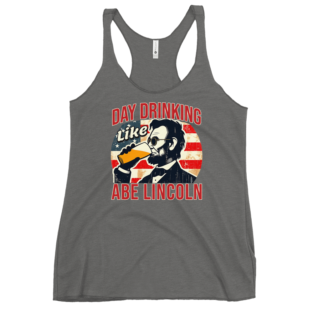 Get ready for July 4th with our Day Drinking Like Abe Lincoln Racerback. Perfect for BBQs & showing off your patriotic pride in style!