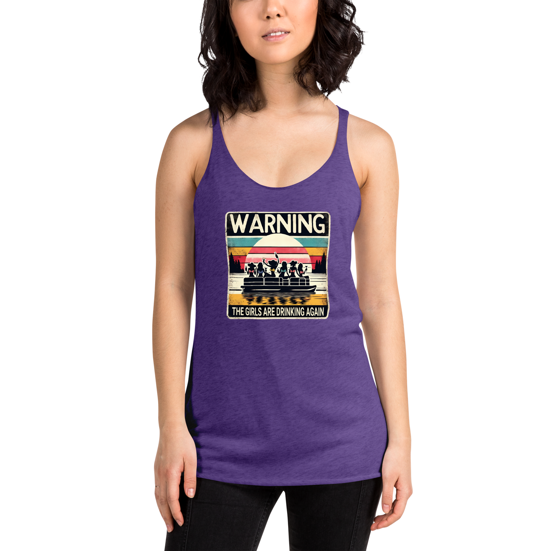 Racerback tank featuring "Warning: The Girls Are Drinking Again" with an illustration of girls drinking on a pontoon boat at sunset.