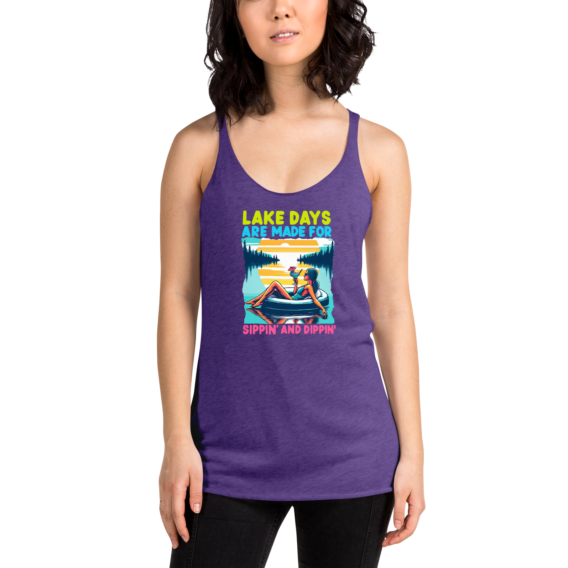 Racerback tank with "Lake Days Are Made for Sipping and Dipping," featuring a woman on a tube float with a cocktail, against a lake and sunset.