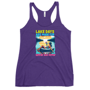 Racerback tank with "Lake Days Are Made for Sipping and Dipping," featuring a woman on a tube float with a cocktail, against a lake and sunset.