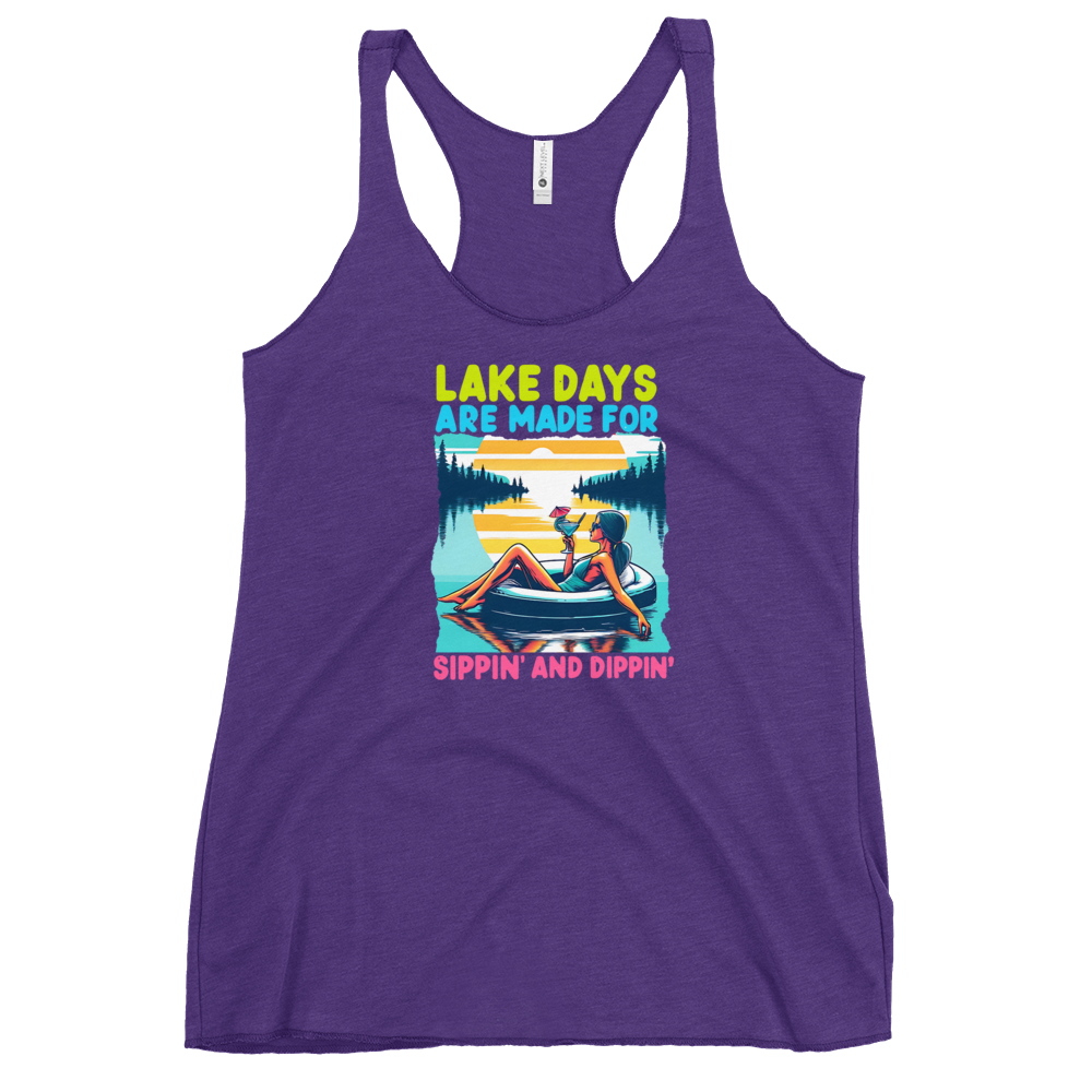 Racerback tank with "Lake Days Are Made for Sipping and Dipping," featuring a woman on a tube float with a cocktail, against a lake and sunset.