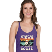 Racerback tank with "I Come to the Lake for the Views and Stay for the Booze," featuring a man in a beach chair, lake, and sunset.