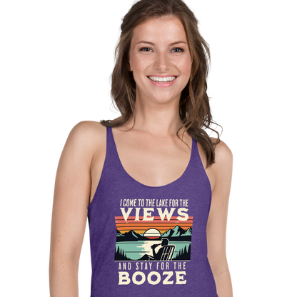 Racerback tank with "I Come to the Lake for the Views and Stay for the Booze," featuring a man in a beach chair, lake, and sunset.