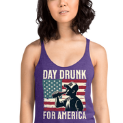 Racerback tank with Day Drunk for America text, silhouette of a man drinking a bottle of beer, and distressed American flag background. Perfect for 4th of July.