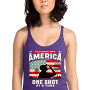 Racerback tank with Celebrating America One Shot at a Time text, silhouette of a man drinking a shot, and distressed American flag background. Perfect for 4th of July.