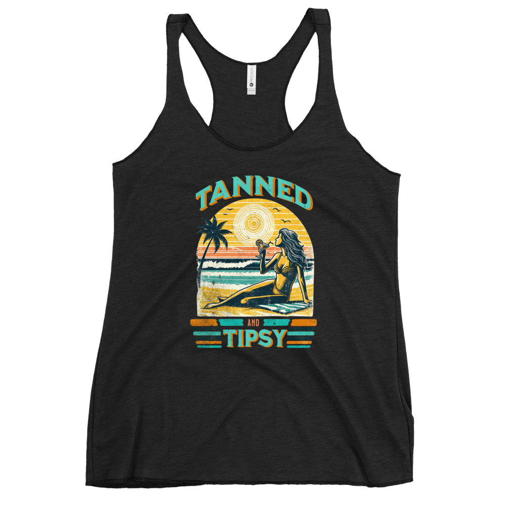 Retro 'Tanned and Tipsy' racerback tank with a woman enjoying a sunset cocktail on the beach, ideal for summer beach parties and day drinking.