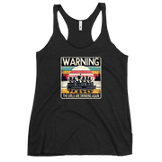 Racerback tank featuring "Warning: The Girls Are Drinking Again" with an illustration of girls drinking on a pontoon boat at sunset.