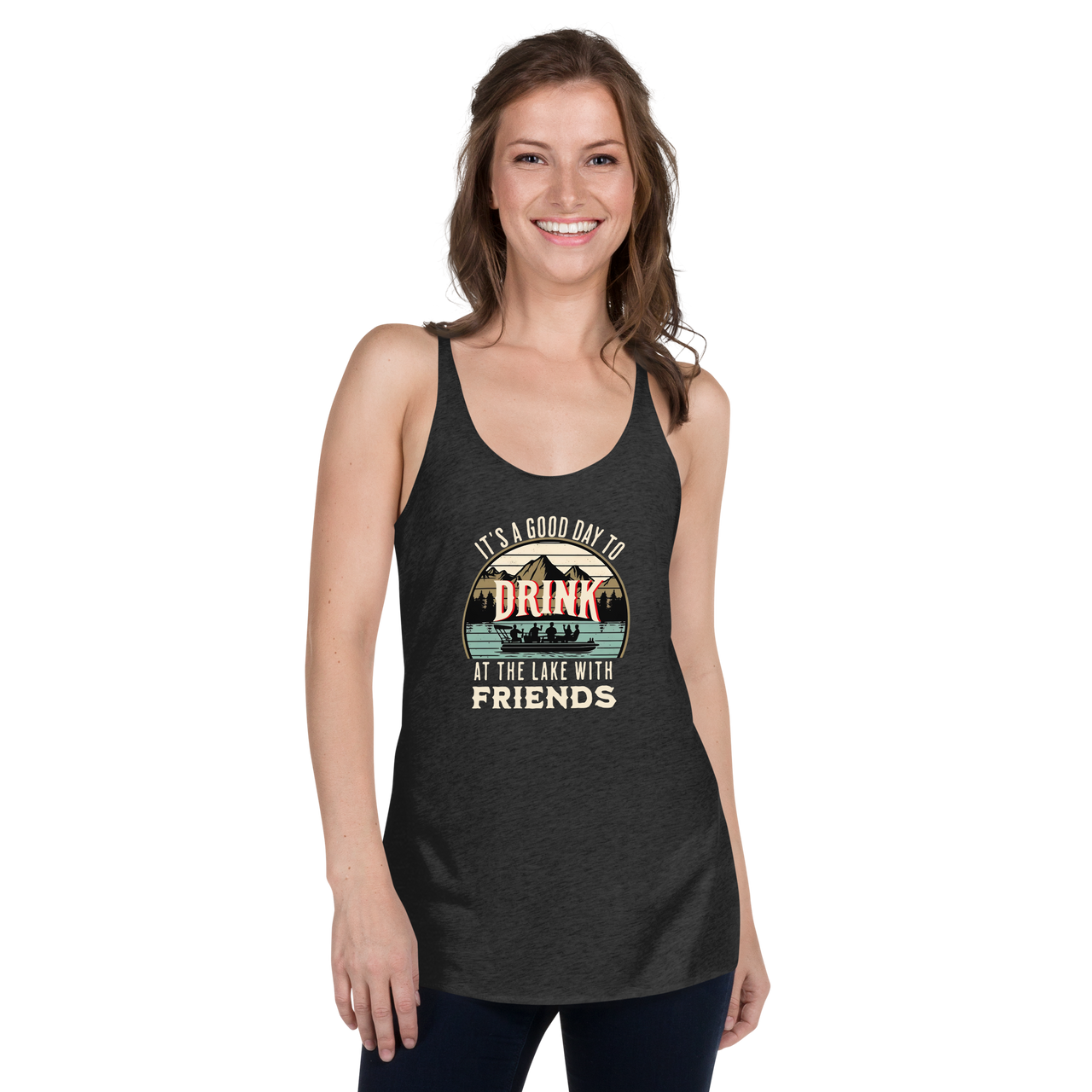 Racerback tank featuring "It's a Good Day to Drink at the Lake with Friends," with people on a boat, lake, and mountains in the background.