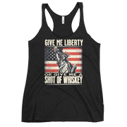 'Give Me Liberty or Give Me Whiskey' text, Statue of Liberty holding a shot glass, and distressed American flag background