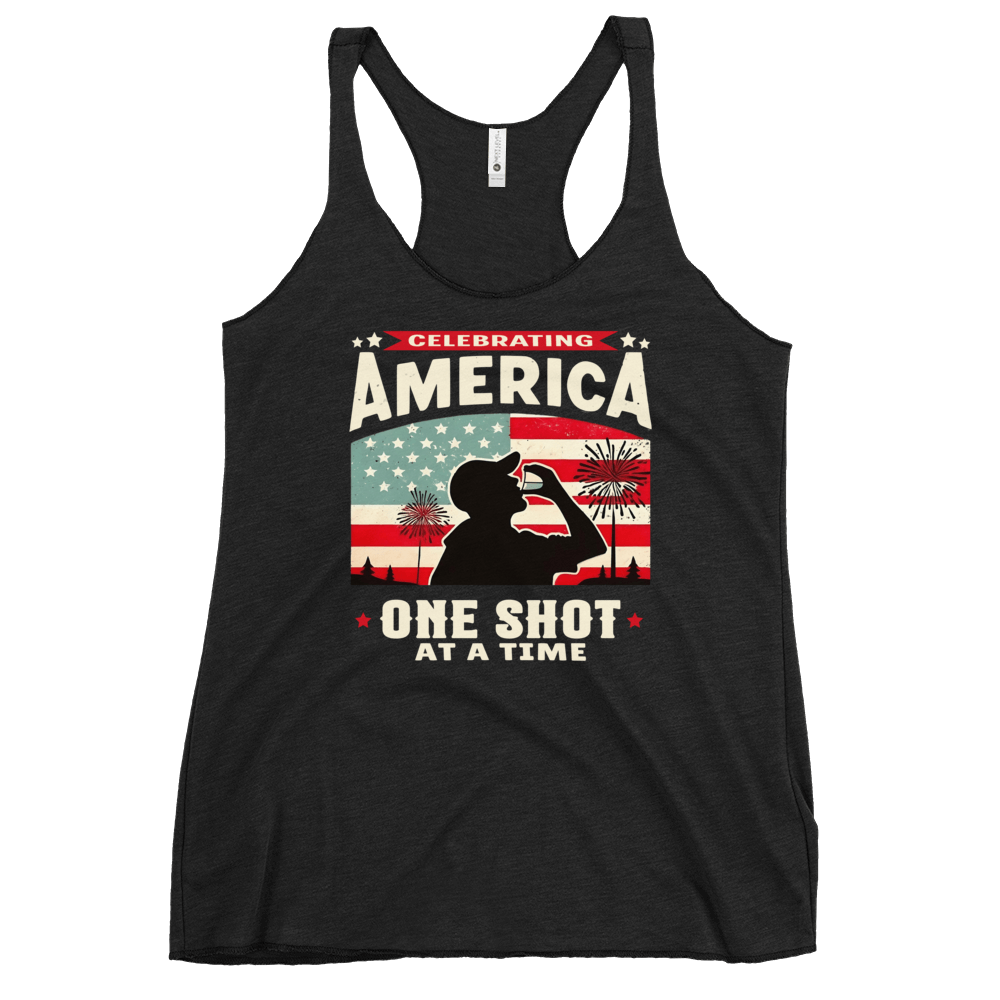 Racerback tank with Celebrating America One Shot at a Time text, silhouette of a man drinking a shot, and distressed American flag background. Perfect for 4th of July.