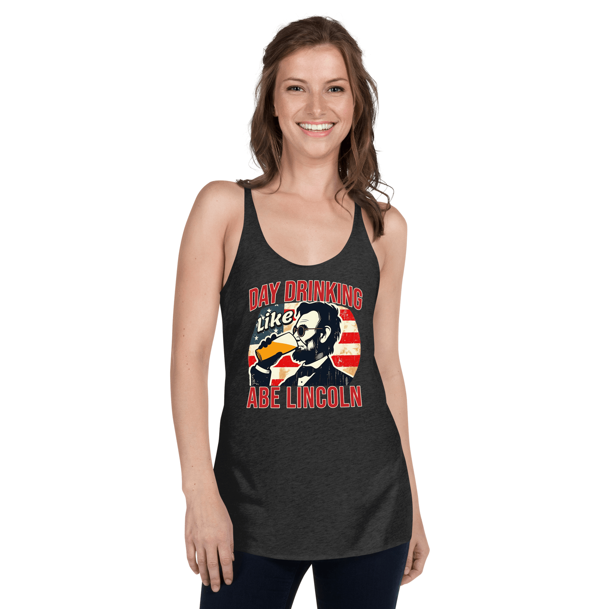 Racerback tank with Day Drinking Like Abe Lincoln text, image of Abe Lincoln drinking a glass of beer, and distressed American flag background. Perfect for 4th of July.