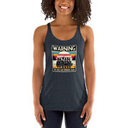 Racerback tank featuring "Warning: The Girls Are Drinking Again" with an illustration of girls drinking on a pontoon boat at sunset.