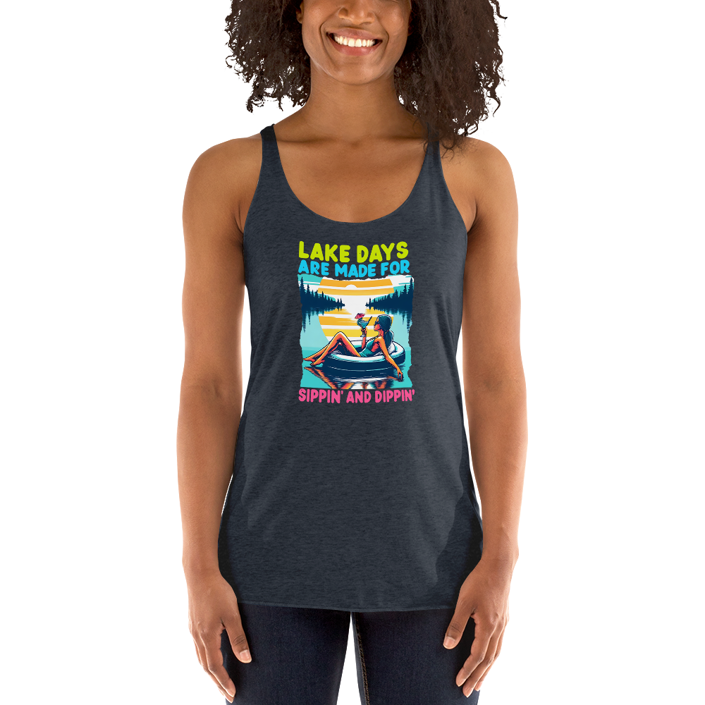 Racerback tank with "Lake Days Are Made for Sipping and Dipping," featuring a woman on a tube float with a cocktail, against a lake and sunset.