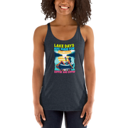 Racerback tank with "Lake Days Are Made for Sipping and Dipping," featuring a woman on a tube float with a cocktail, against a lake and sunset.