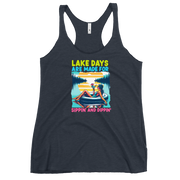 Racerback tank with "Lake Days Are Made for Sipping and Dipping," featuring a woman on a tube float with a cocktail, against a lake and sunset.