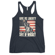 'Give Me Liberty or Give Me Whiskey' text, Statue of Liberty holding a shot glass, and distressed American flag background