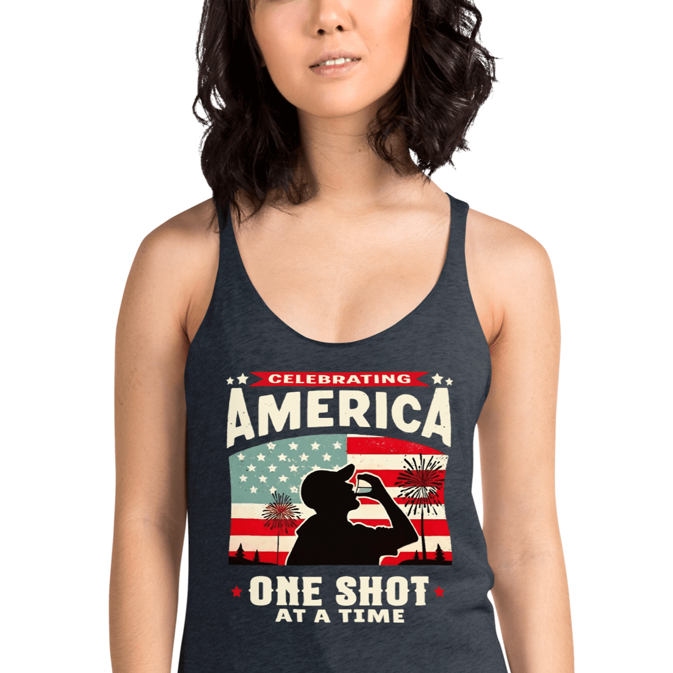 Racerback tank with Celebrating America One Shot at a Time text, silhouette of a man drinking a shot, and distressed American flag background. Perfect for 4th of July.