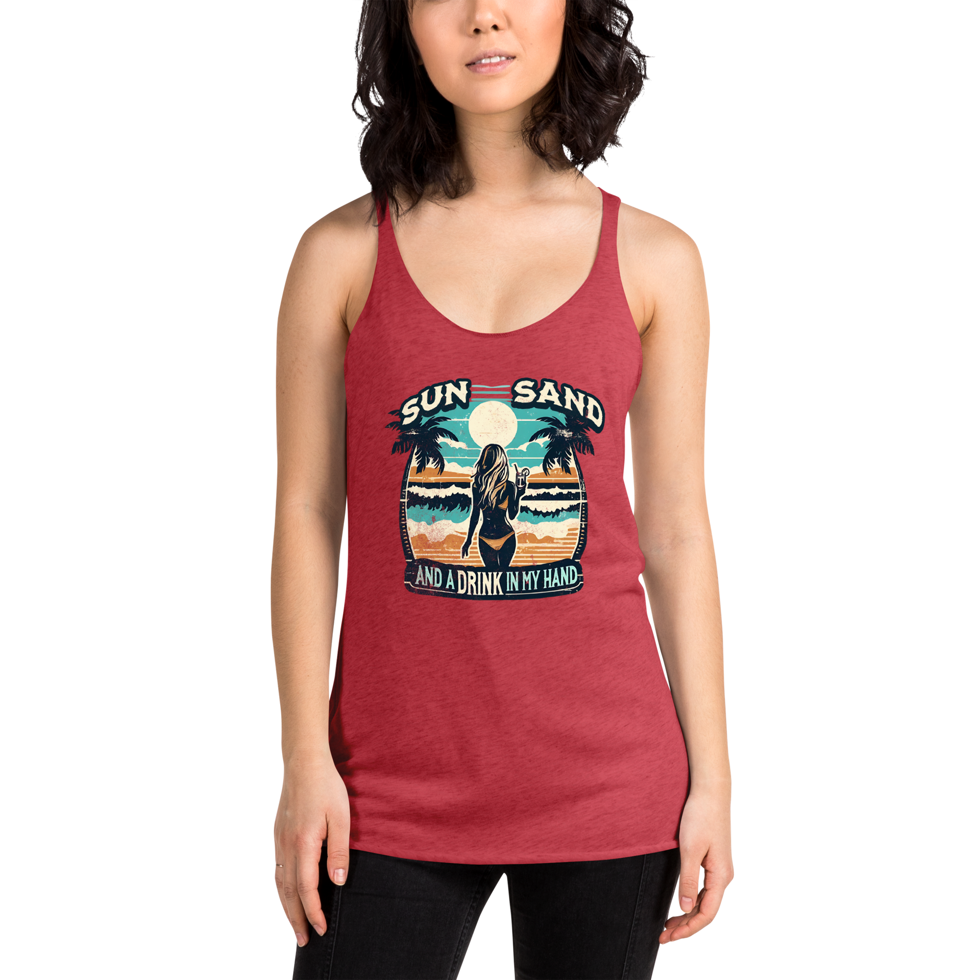 Beach scene on 'Sun, Sand, and a Drink in My Hand' racerback tank, with woman holding cocktail.