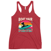 Racerback tank with "Boar Hair Don't Care, But Where's My Drink?" featuring a woman on a jet ski against a sunset.